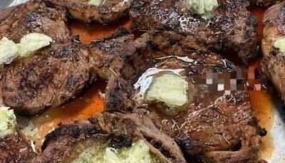Grilled Ribeye Steaks with Herb Butter